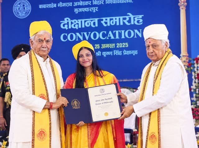Receiving the degree at the convocation ceremony, 25 August 2025